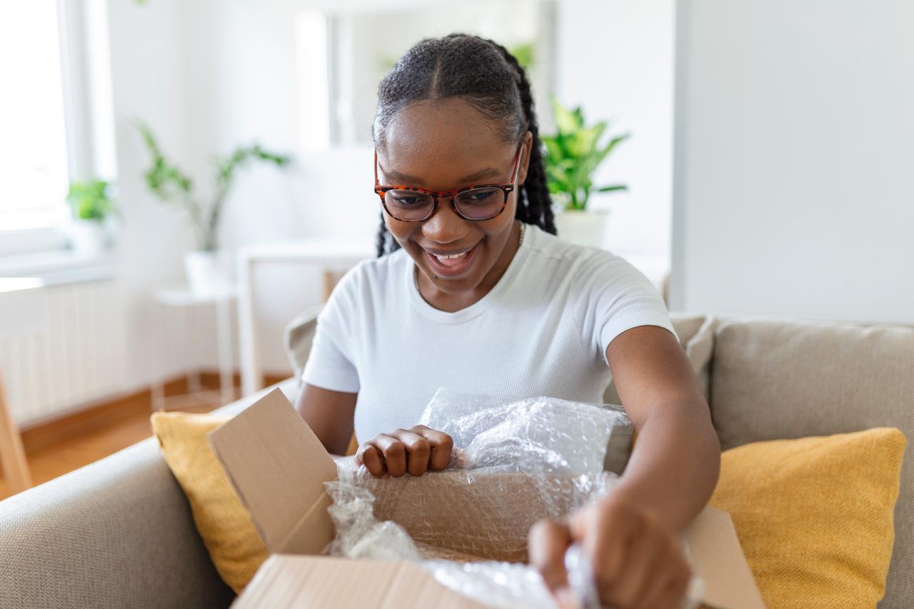 Woman Opening Package